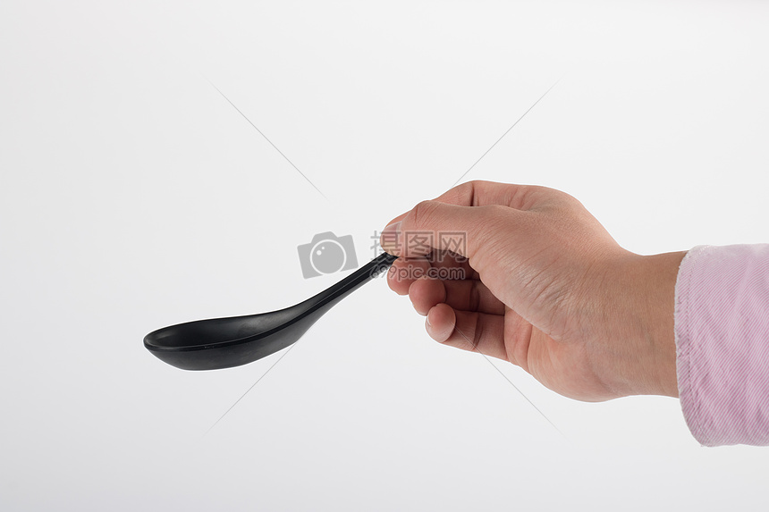 拿勺子的手棚拍