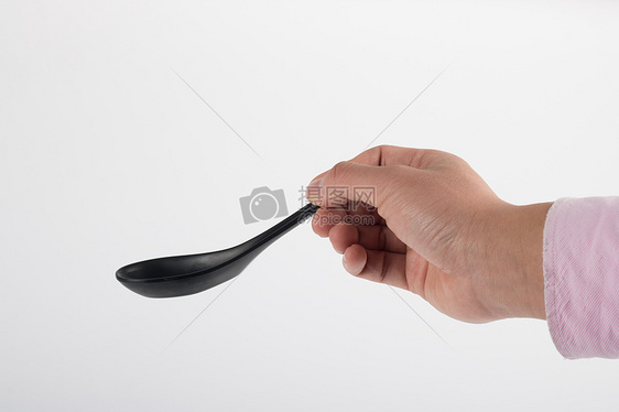 拿勺子的手棚拍