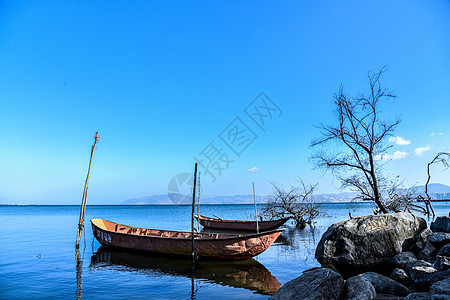 洱海日出云南大理下关洱海大理古城背景