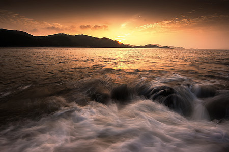 海浪礁石海浪背景