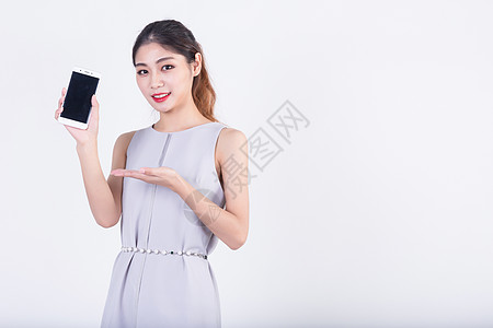 商务套裙女性展示手机高清图片