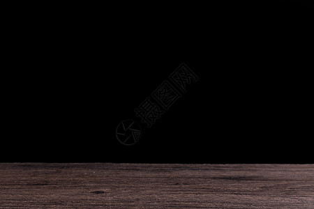 木制桌面和黑背景背景图片