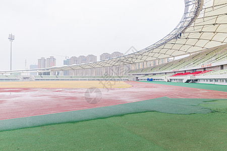 城市建筑阴雨天体育场高清图片