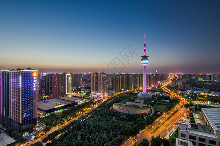 昆明国际会展中心陕西省电视塔夜景背景