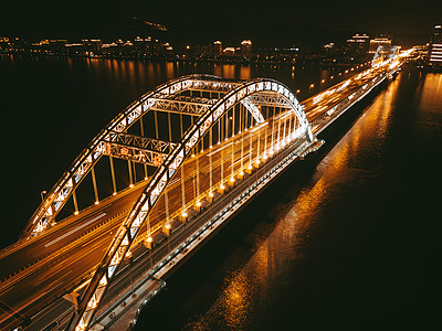 火车夜景城市桥梁夜景背景