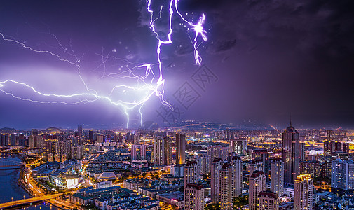 北京鸟巢夜景闪电中的城市设计图片