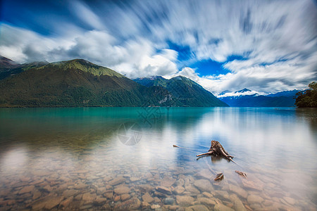 森林湖泊倒影巴松措背景