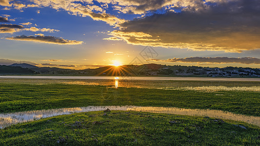 内蒙古一望无际的草原日落背景图片