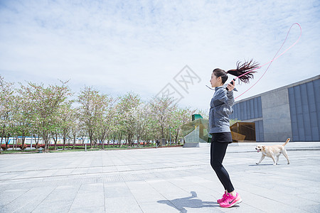 女性养生大气户外运动女孩跳绳背景