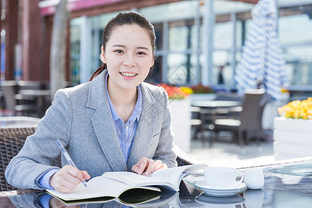 商务学习知性女人阅读书写背景