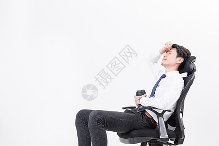 疲倦休息思考的商务人喝咖啡图片