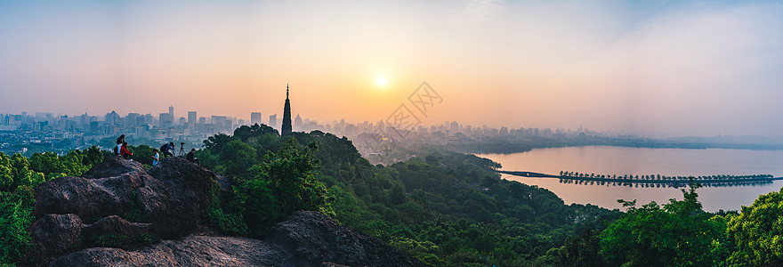 晚霞风景西湖长桥雷峰塔背景