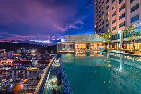 游泳池夜景马来西亚福朋喜来登酒店背景