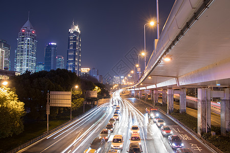 夜间公交高架下城市车流夜景背景