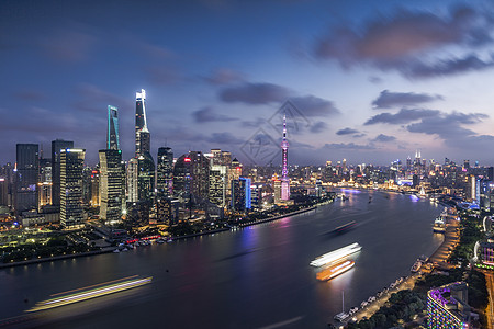 黄浦江游船星光璀璨的上海北外滩夜景背景