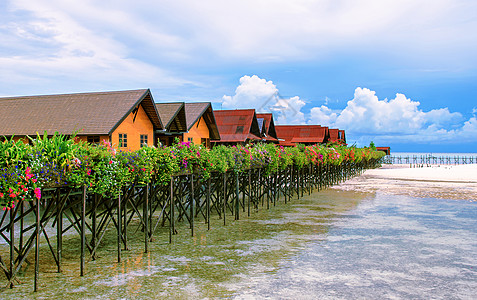 沙滩彩色海边浪漫度假小木屋背景