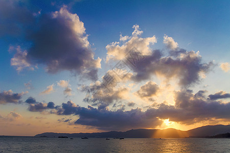 夕阳风景亚龙湾日落背景