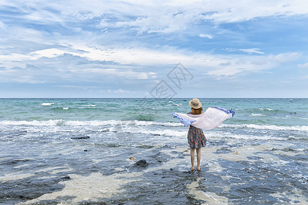 涠洲岛沙滩沿岸海边少女背影背景