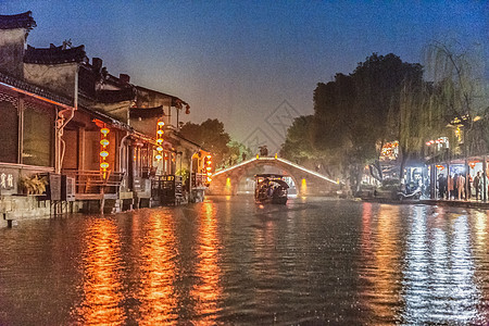 红酒意境西塘水上夜景背景