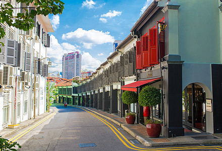 手绘蓝天新加坡牛车水街景背景