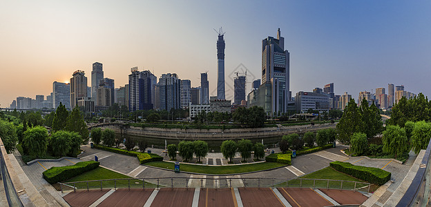 公园夜景日落的北京CBD背景