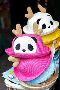 熊猫卡通遮阳帽背景