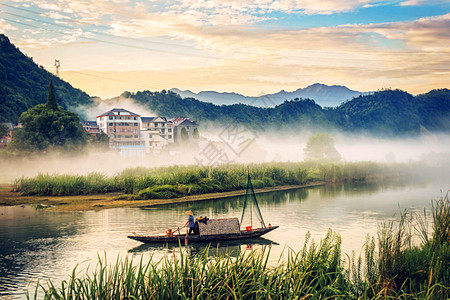 浙江绍兴清晨渔船晨烟背景