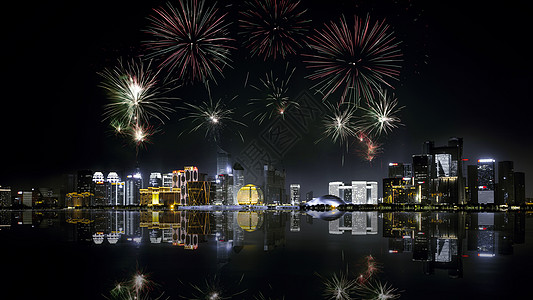 建筑大厦燃放烟花的钱江新城夜景背景