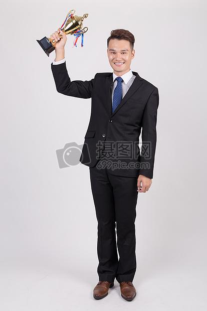 手握奖杯男性人像成功人士职场