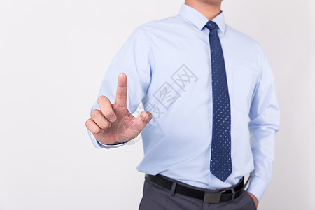 商务男士单手指点击触屏动作手势背景图片
