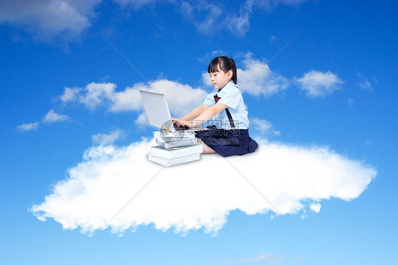 坐在云层中学习的孩子图片