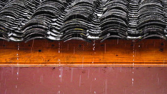 雨特写雨中的瓦片房屋特写背景