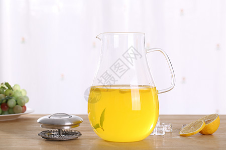 玻璃茶壶柠檬茶背景图片