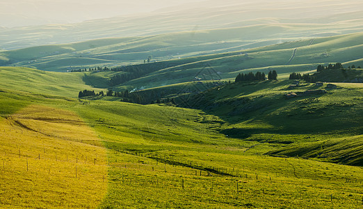 新疆喀拉峻草原日落光影线条美感背景图片