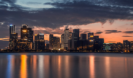 钱塘江潮水钱江新城夜景城市美景背景