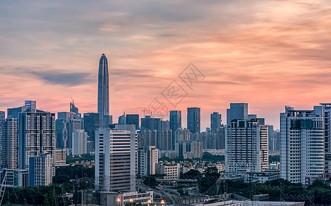 深圳平安大楼红霞中的城郭建筑城市风光背景