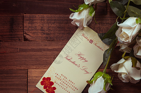 婚礼中式风布置白玫瑰与贺卡背景