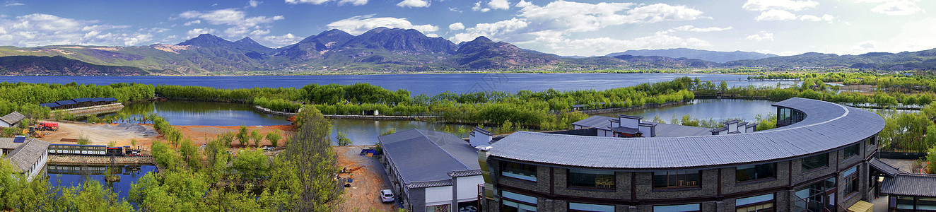 公园湖水拉市海山水全景背景