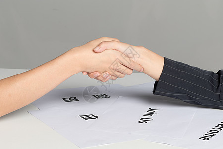 商务合作握手交易图片