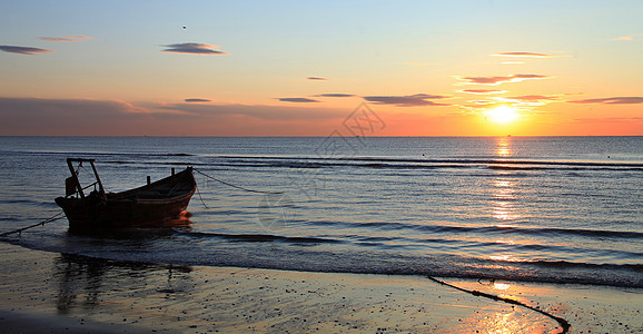 沙滩小舟背景图片