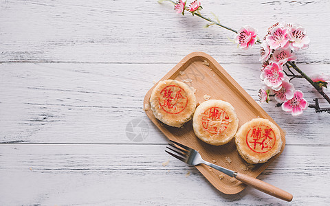 中秋游园中秋传统美食老月饼背景