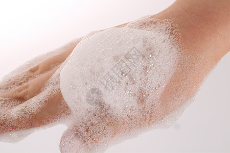 手上的泡沫洗手泡沫高清图片
