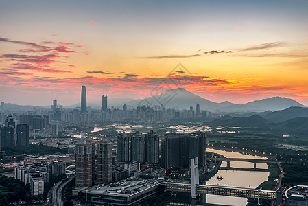 朝霞满天城市建筑风光图片