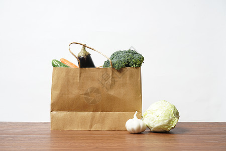 白菜萝卜购物袋中的蔬菜背景