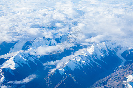 雪山云海飞机上航拍仙境云层高空背景图片