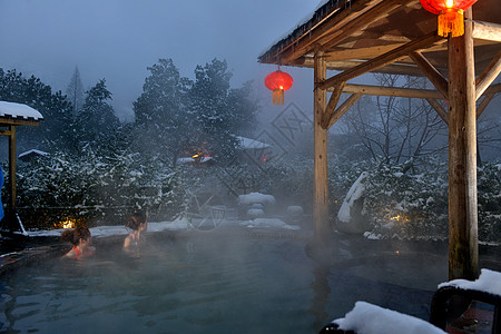 水池夜景在冰天雪地中泡温泉背景