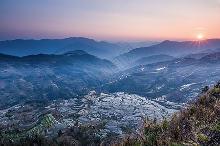 彩色梯田云南元阳梯田老虎嘴日落背景