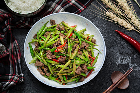 生炒牛肉饭牛肉辣椒爆炒芦笋背景