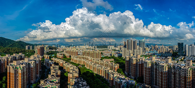 深圳梅林蓝天白云下的城市风光背景