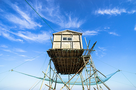 空中楼阁海边高脚屋背景